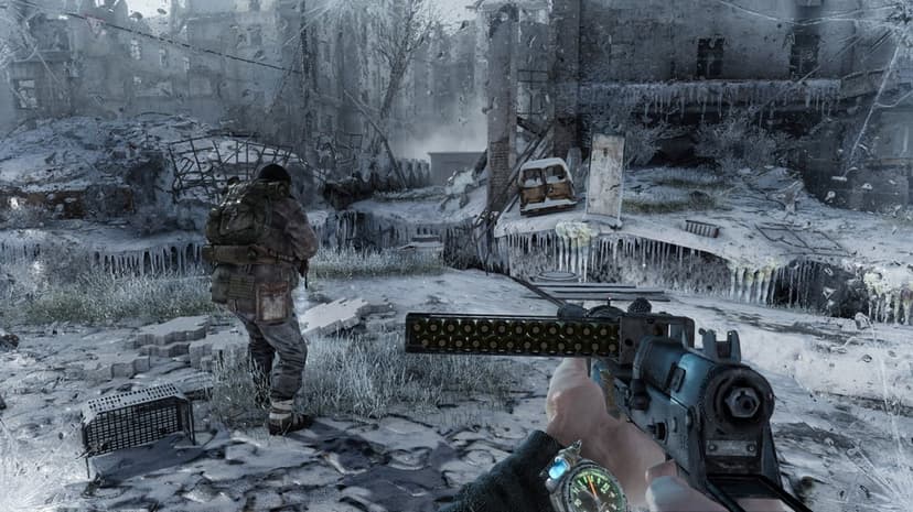 First-person view of a survivor holding a makeshift gun in a frozen city with ruined buildings and snow.