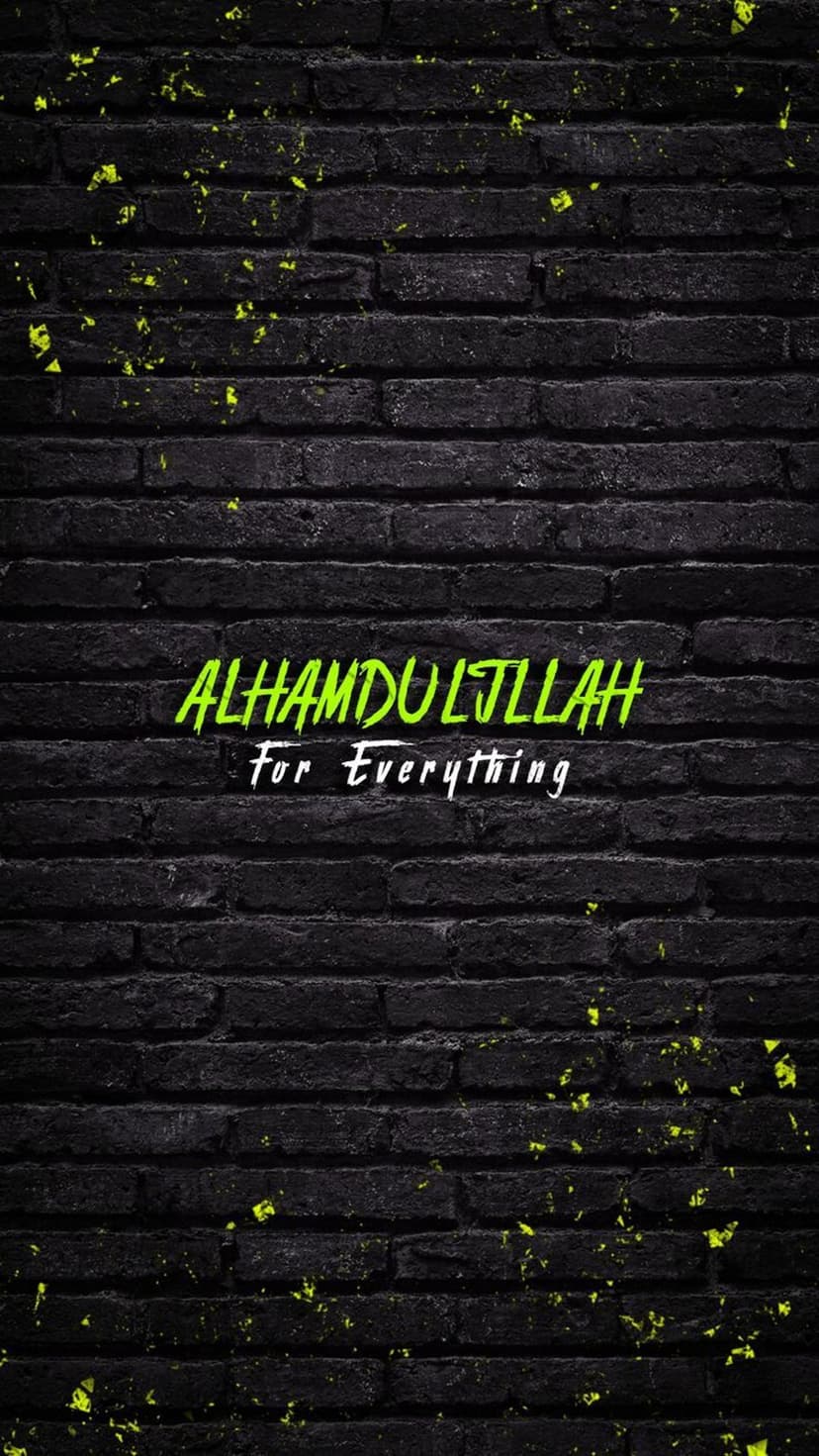 Green Alhamdulillah For Everything text centered on a dark weathered brick surface with mossy accents and texture.