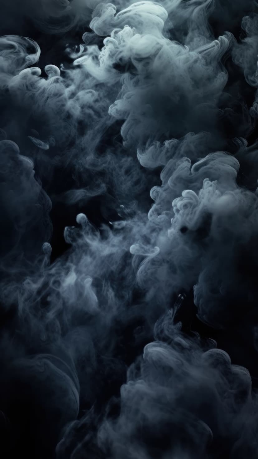 Wispy charcoal smoke plumes swirl in fluid patterns against a solid black background with sharp contrast.
