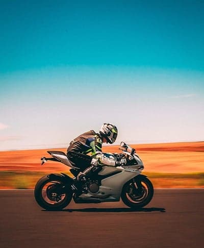Dynamic Sportbike Racing Action Mobile Background