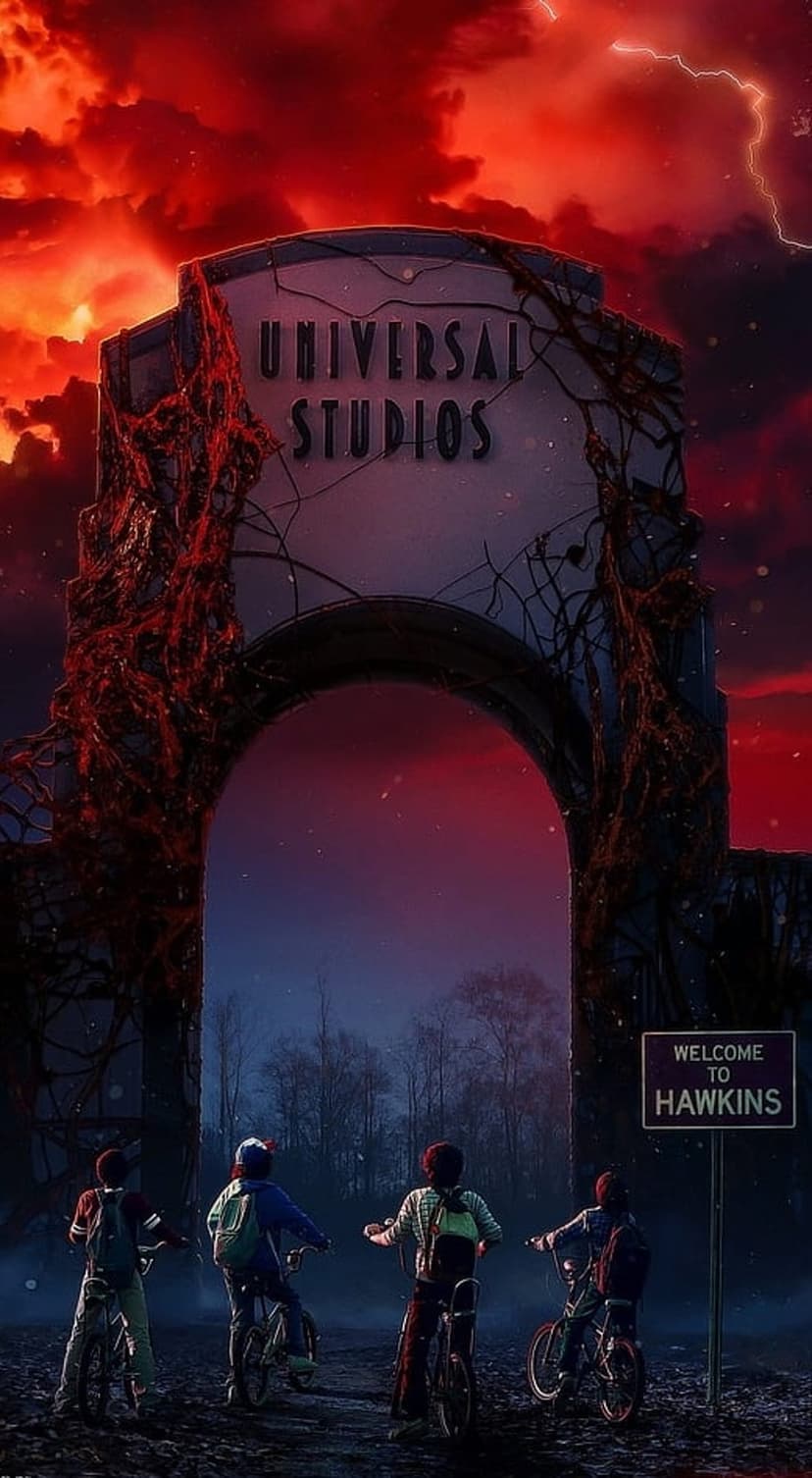 Four boys on bicycles arrive at a vine-choked archway under a stormy red sky with glowing crimson lightning.