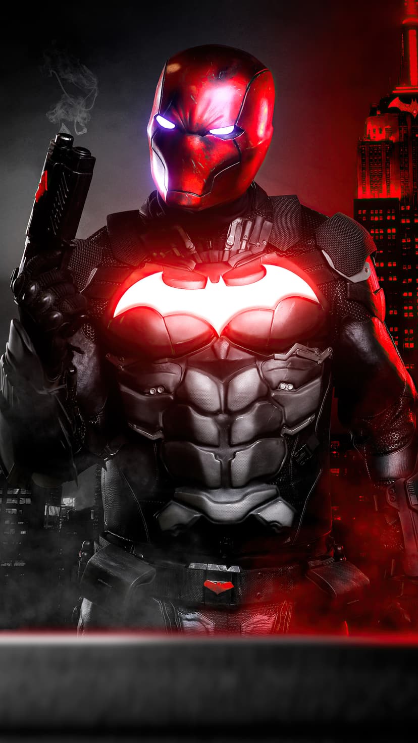 Red Hood in tactical armor with a glowing red bat symbol holding a smoking gun in a dark, rain-slicked city.