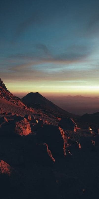 Alpenglow Awakening - Mountainous Peaks at Sunrise