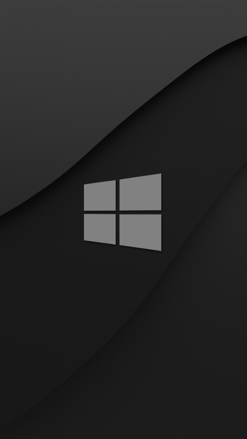 Windows logo centered on a dark charcoal background with gentle flowing wave textures and soft gray shadows.