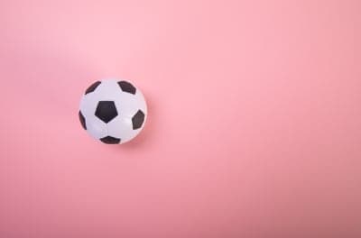 Classic Soccer Ball on Pink Background