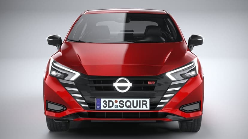 Front view of a red sporty sedan with glowing LED headlights and a black grille against a gray background.