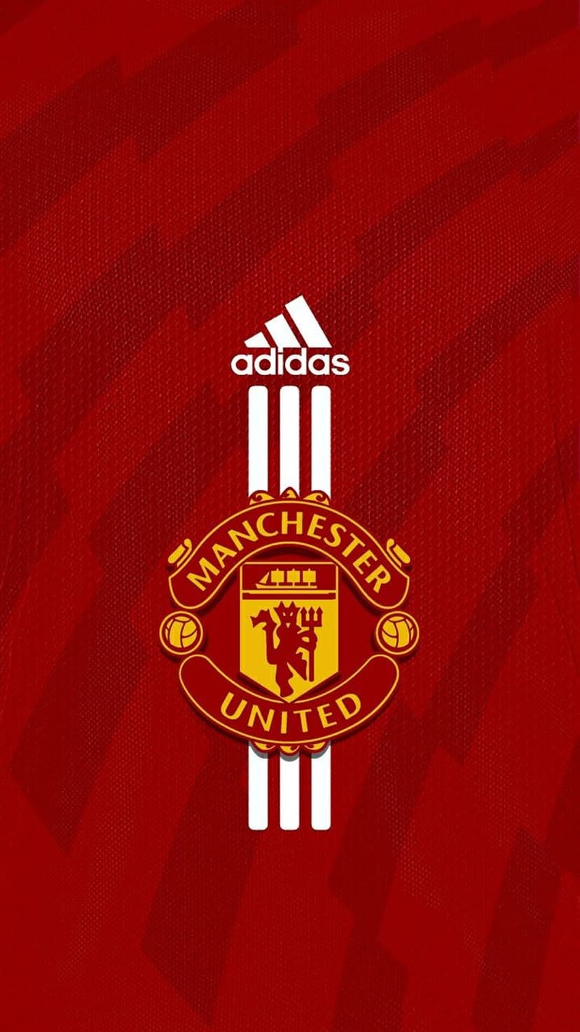 Manchester United club emblem and white vertical stripes centered on a textured red football jersey background.