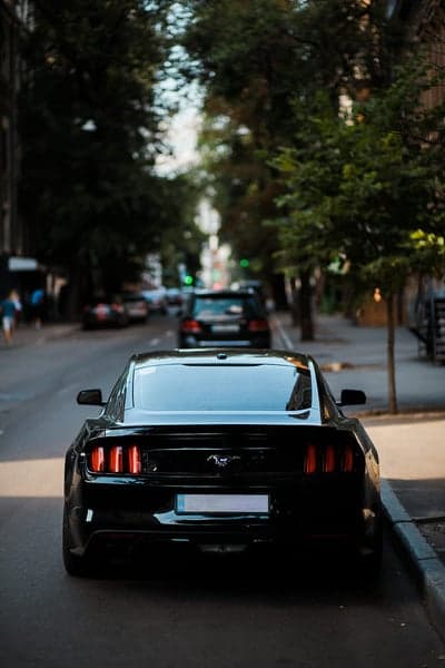 Black Ford Mustang GT Rear View Urban Street Phone Wallpaper