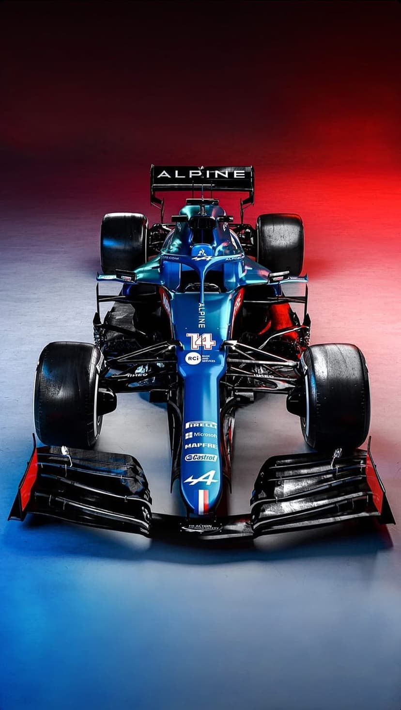Alpine F1 race car with number 74 on the nose centered under a red and blue gradient lighting atmosphere.