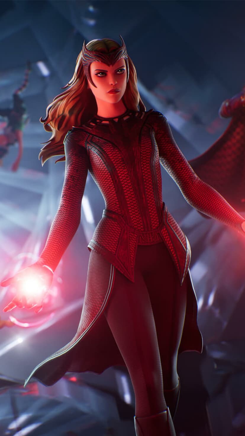 Scarlet Witch with glowing red hands wearing a black and crimson suit against a blurred magical background.