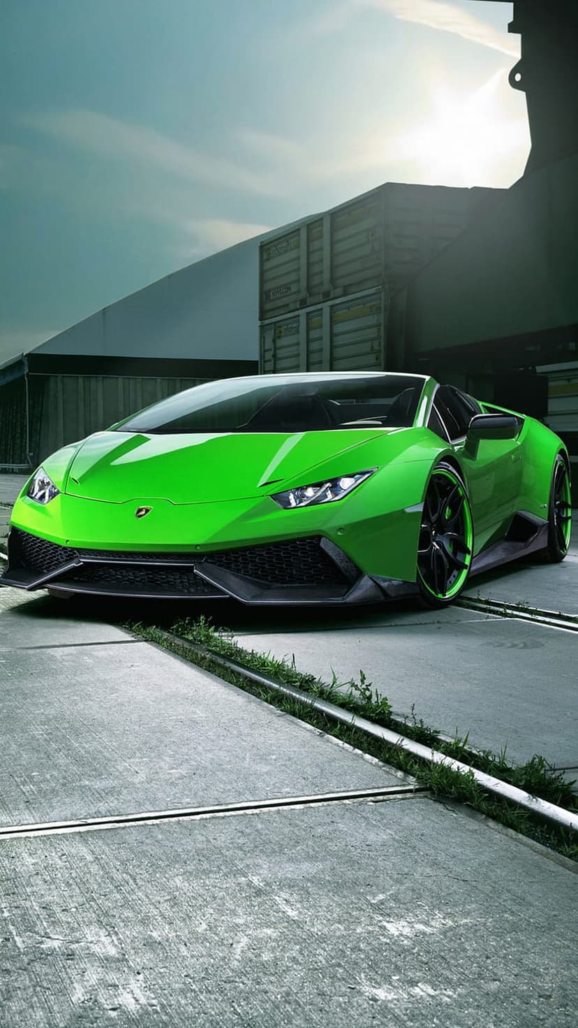 Lime green Lamborghini Huracan convertible parked on textured concrete with shipping containers in the background.