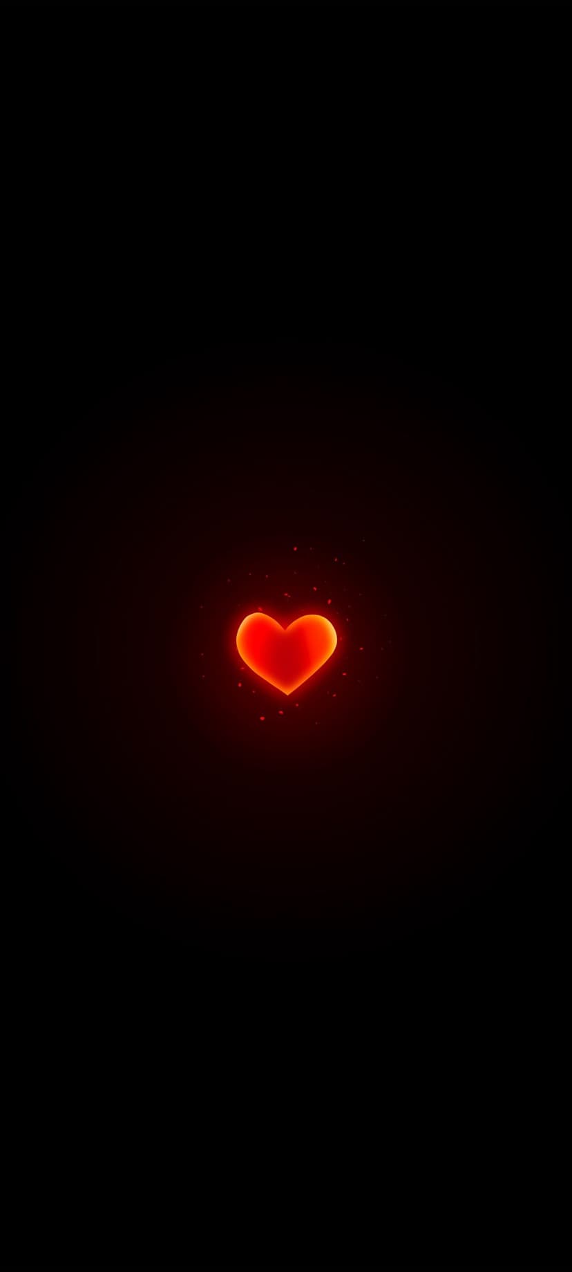 Radiant red heart glowing on a dark black background with tiny shimmering particles and soft light gradients.