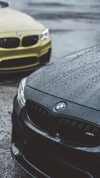 Black and Yellow BMW M4 Rain Night Mobile Wallpaper
