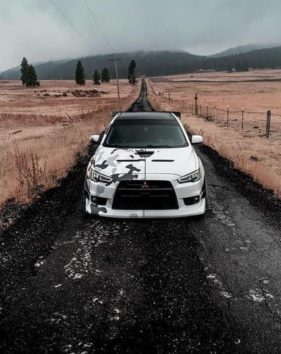 White Mitsubishi Lancer Evolution Camo Phone Wallpaper