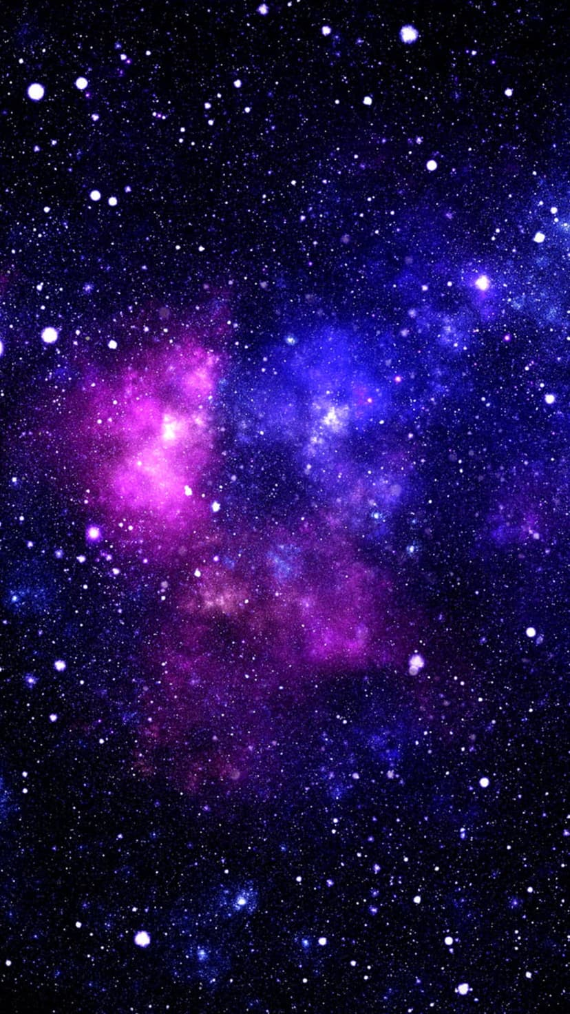 Purple nebula clouds swirl amidst a field of tiny white stars against the dark void of outer space.