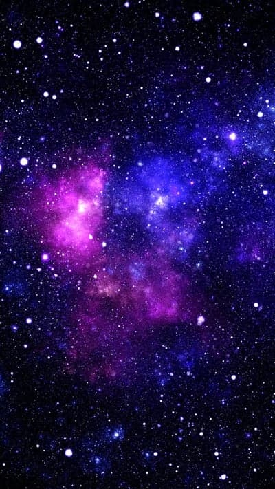 Vibrant Purple and Blue Nebula with Stars