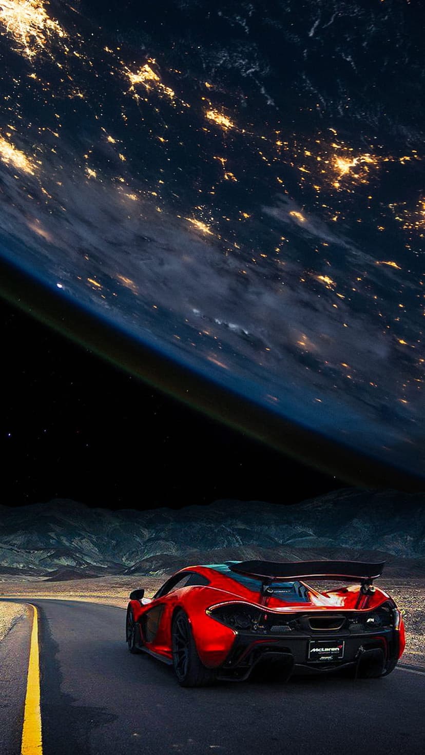 Red McLaren supercar on a dark desert road with a massive, glowing Earth planet visible in the night sky above.