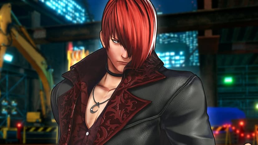 Iori Yagami with red hair and leather jacket stands before a blurred night construction site background.