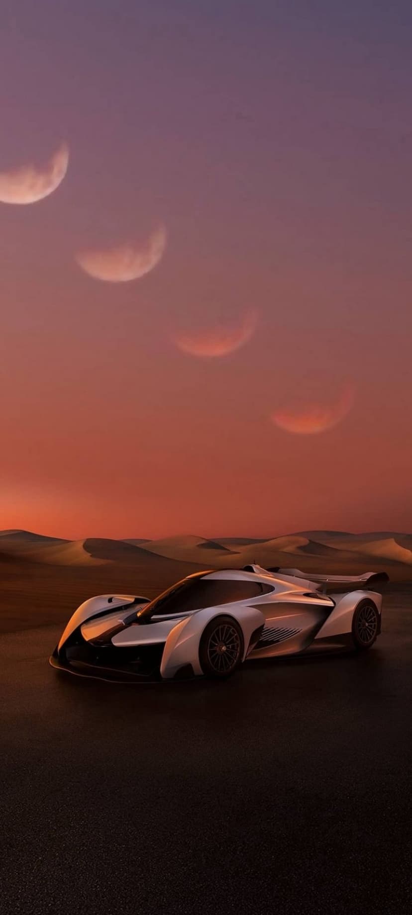 White futuristic car parked on a desert road under a purple sunset sky with three crescent moons above dunes.