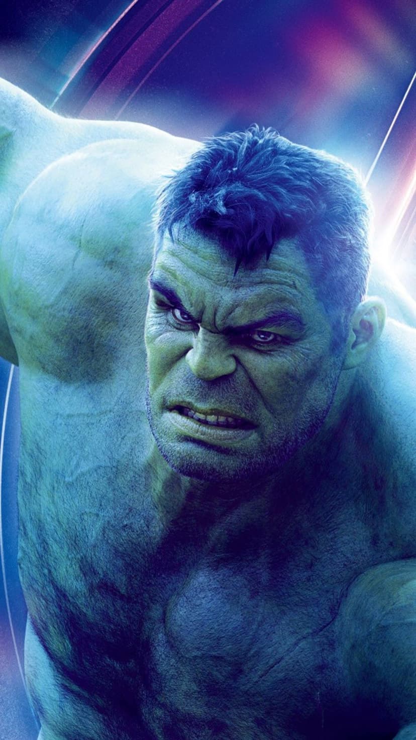 Hulk displays a furious expression with furrowed brows and bared teeth against a purple cosmic background.