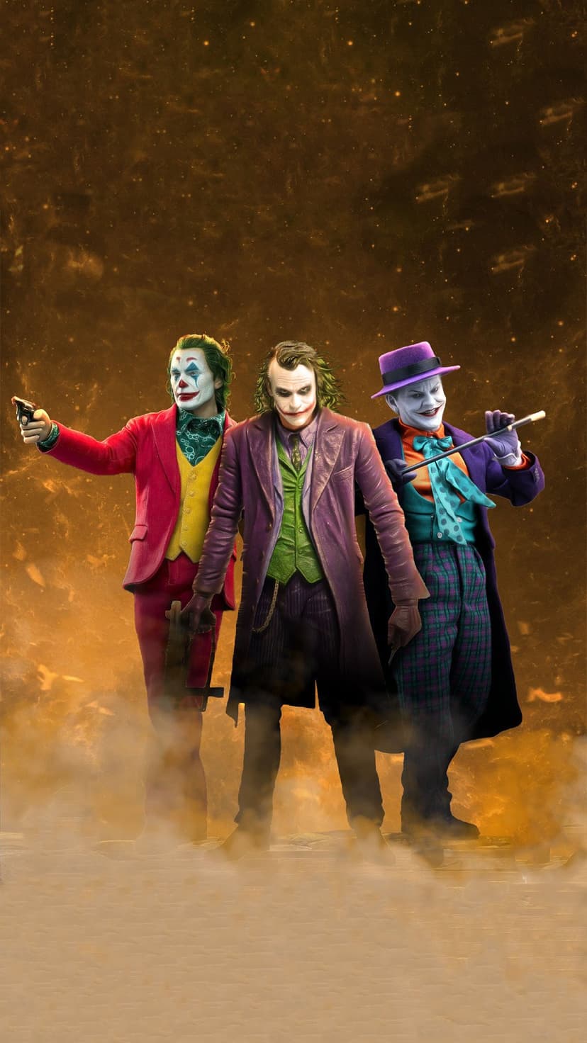 Three Joker versions stand together amidst glowing orange embers and thick gray smoke against a dark background.