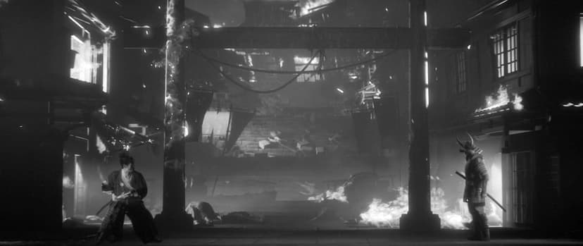 Two samurai face off in a burning Japanese village with a torii gate and thick smoke in black and white.