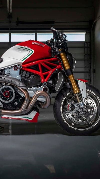 Red and White Ducati Motorcycle with Gold Forks