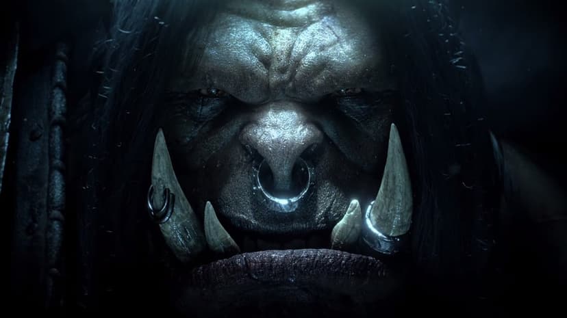 Close up of a dark fantasy orc warrior with ivory tusks and a nose ring in cinematic low-key lighting.