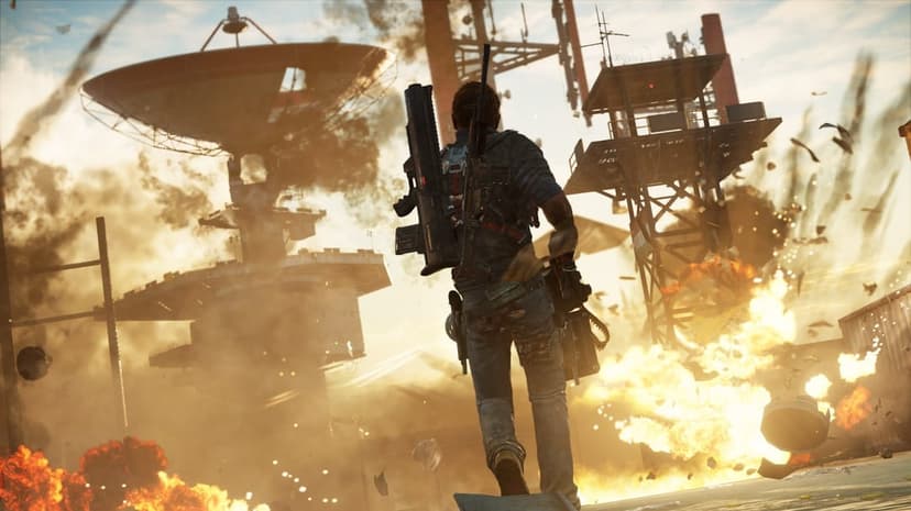 A soldier with a rocket launcher walks through an industrial base with massive orange explosions and flying debris.