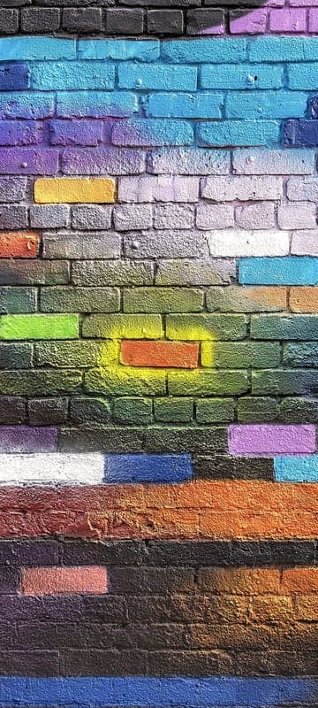 Colorful Graffiti Brick Wall with Abstract Patterns