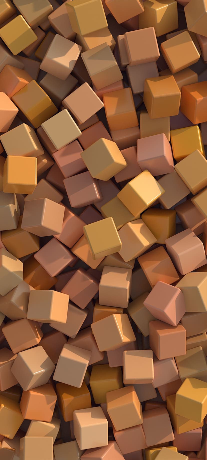 Textured geometric cubes in shades of terracotta, ochre, and sand cast soft shadows in a dense overhead pile.