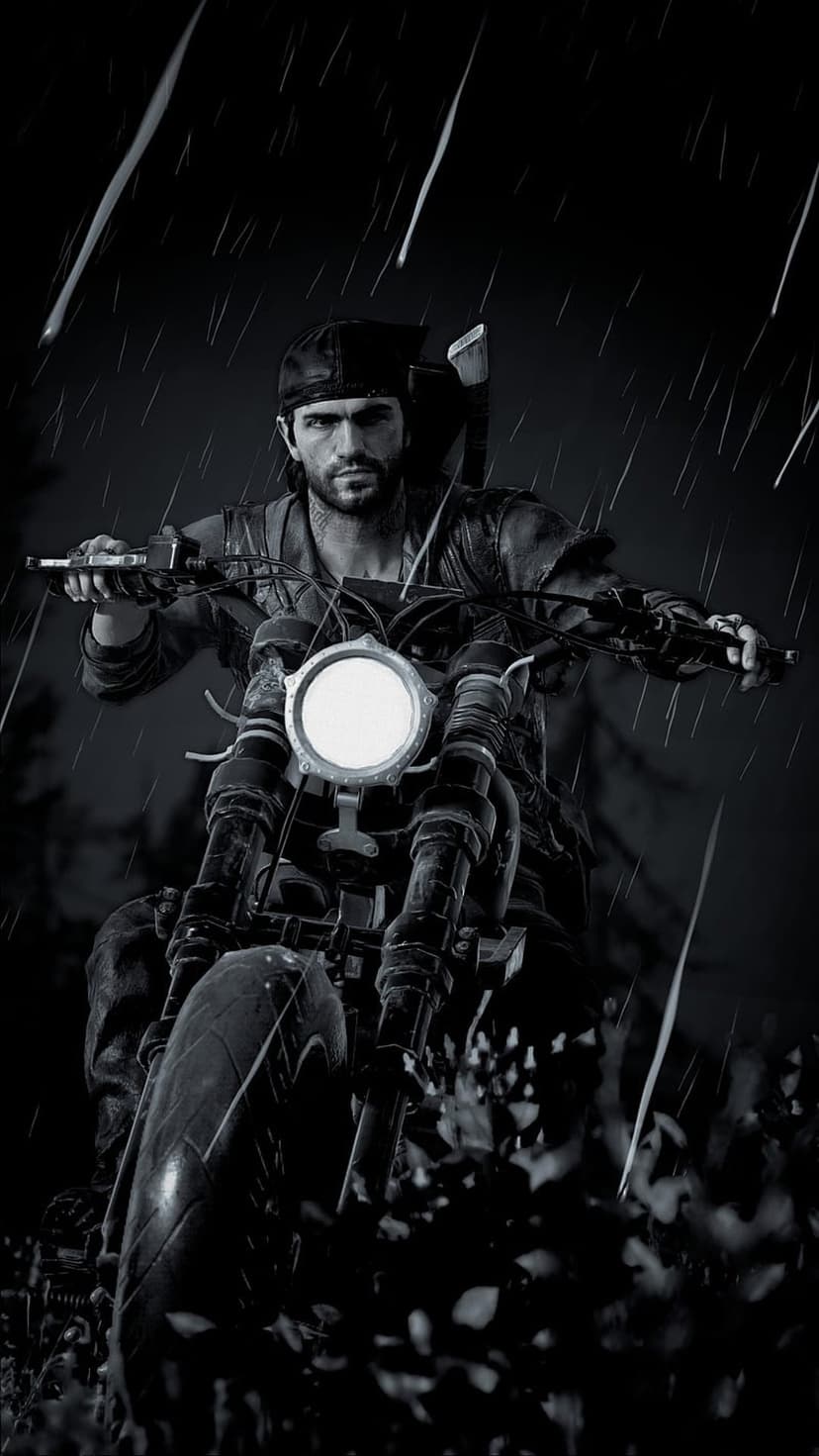 Deacon St. John rides a motorcycle through heavy rain while wearing a leather jacket with an axe on his back.