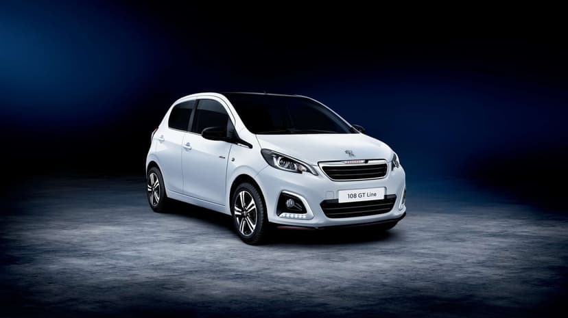 White Peugeot 108 GT Line hatchback angled in a dark studio with blue gradients and textured flooring.