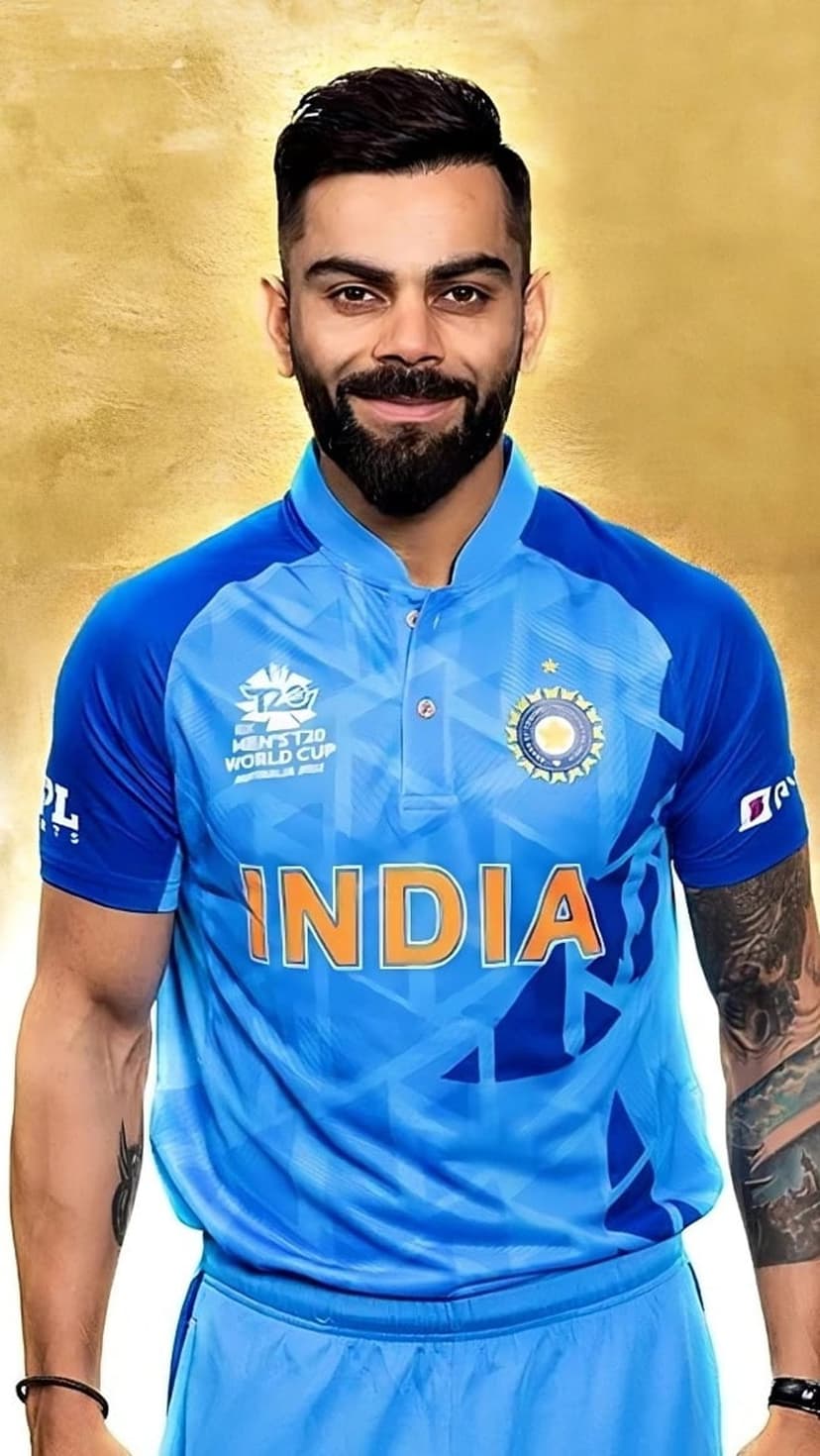 Virat Kohli in a blue Indian T20 jersey with the BCCI emblem, looking ahead against a soft blurred background.