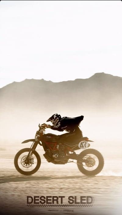 Flying Dirt Bike Desert Sled Mobile Screen Background