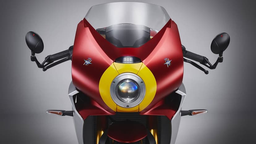 Symmetrical front profile of a red and yellow MV Agusta motorcycle featuring a round LED headlight and mirrors.