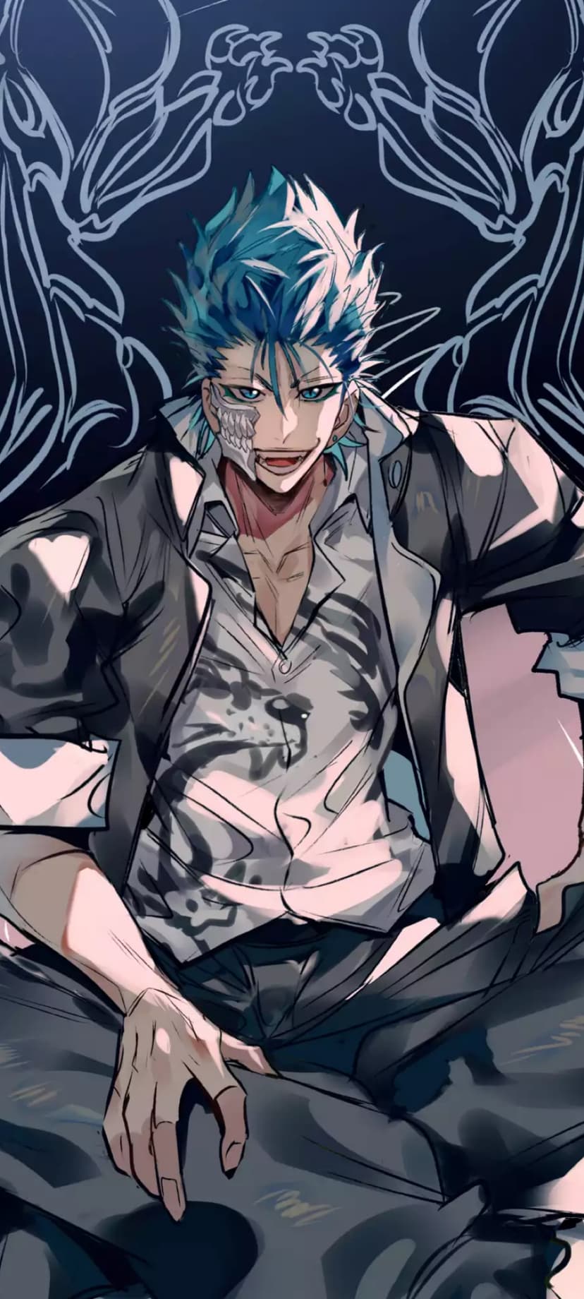 Blue haired man wearing a skeletal mask and grey jacket sits before abstract feathered wing-like shapes.