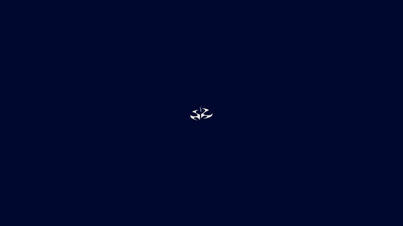 Small white Hitman ICA emblem centered on a solid dark navy blue background for landscape desktop screens.