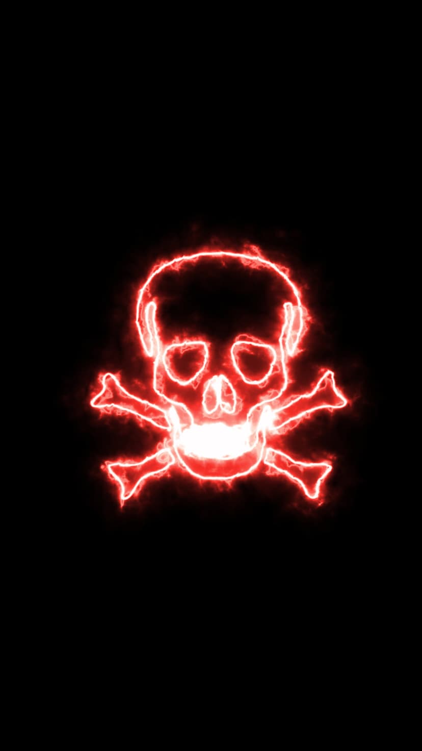 Red neon skull and crossbones glowing with intense crimson light against a solid dark black backdrop.