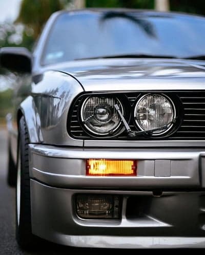 Close-up of a Silver BMW E30 M3 Frontal View