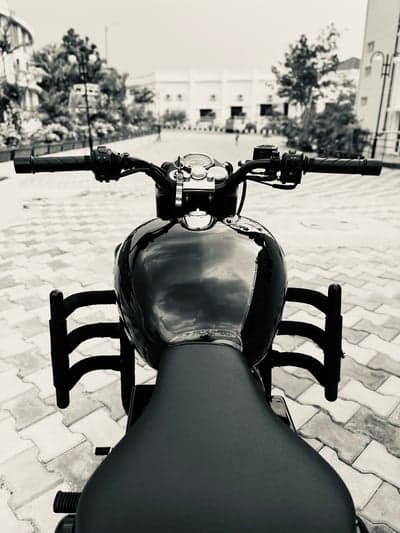 Dark Royal Enfield Classic Motorcycle Portrait Wallpaper