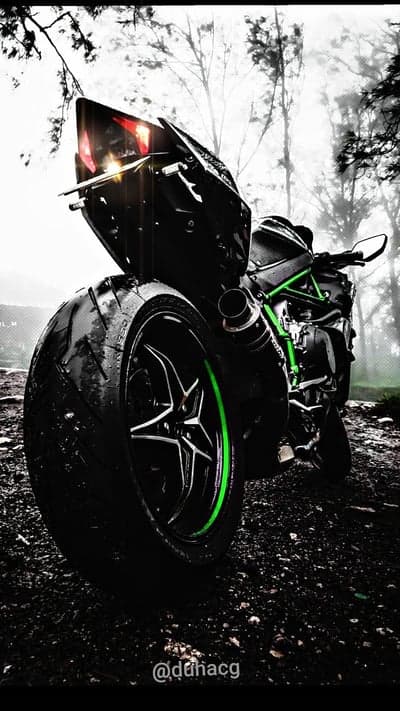 Kawasaki Ninja H2R Sportbike on Wet Asphalt Phone Background