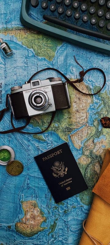 Vintage Travel Essentials: Camera, Passport, Map, and Typewriter