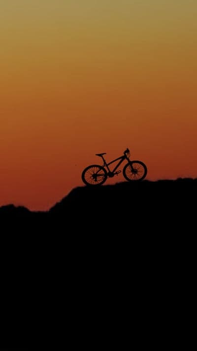 Mountain Bike Ridge Silhouette Sunset Mobile Wallpaper