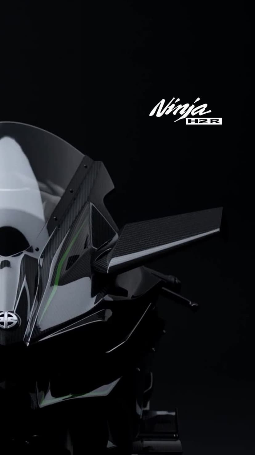 Kawasaki Ninja H2R motorcycle featuring carbon fiber fairings and a silver logo against a solid black background.