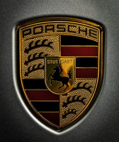 Porsche Gold Shield Crest Vertical Mobile Wallpaper