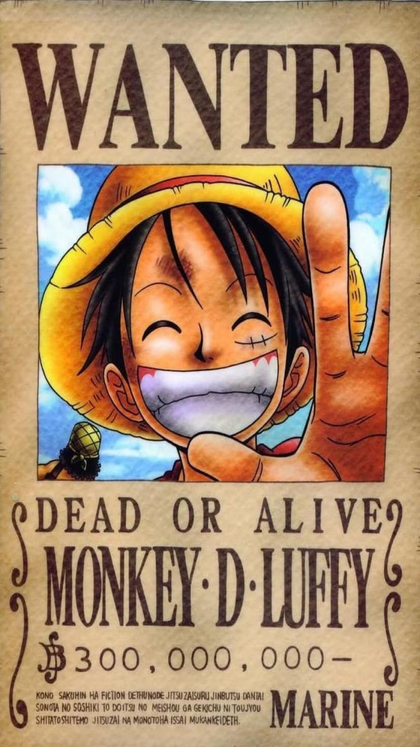 Monkey D. Luffy grins under a straw hat on a weathered parchment bounty poster with bold black text and numbers.