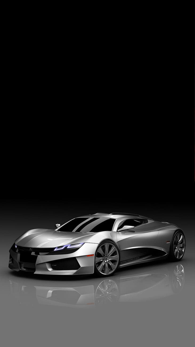 Metallic silver sports car with glowing LED headlights reflects on a glossy black floor in a dark studio.