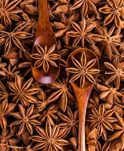 Star Anise Spice: Close-up Macro View with Wooden Spoon