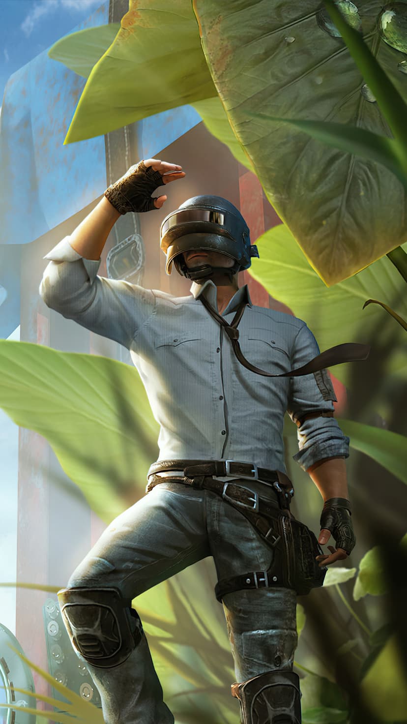 Battle royale soldier in a blue shirt and helmet looks up while standing in a thick green forest with ruins.